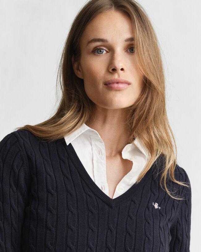 Maglia con scollo a V in cotone elasticizzato a trecce