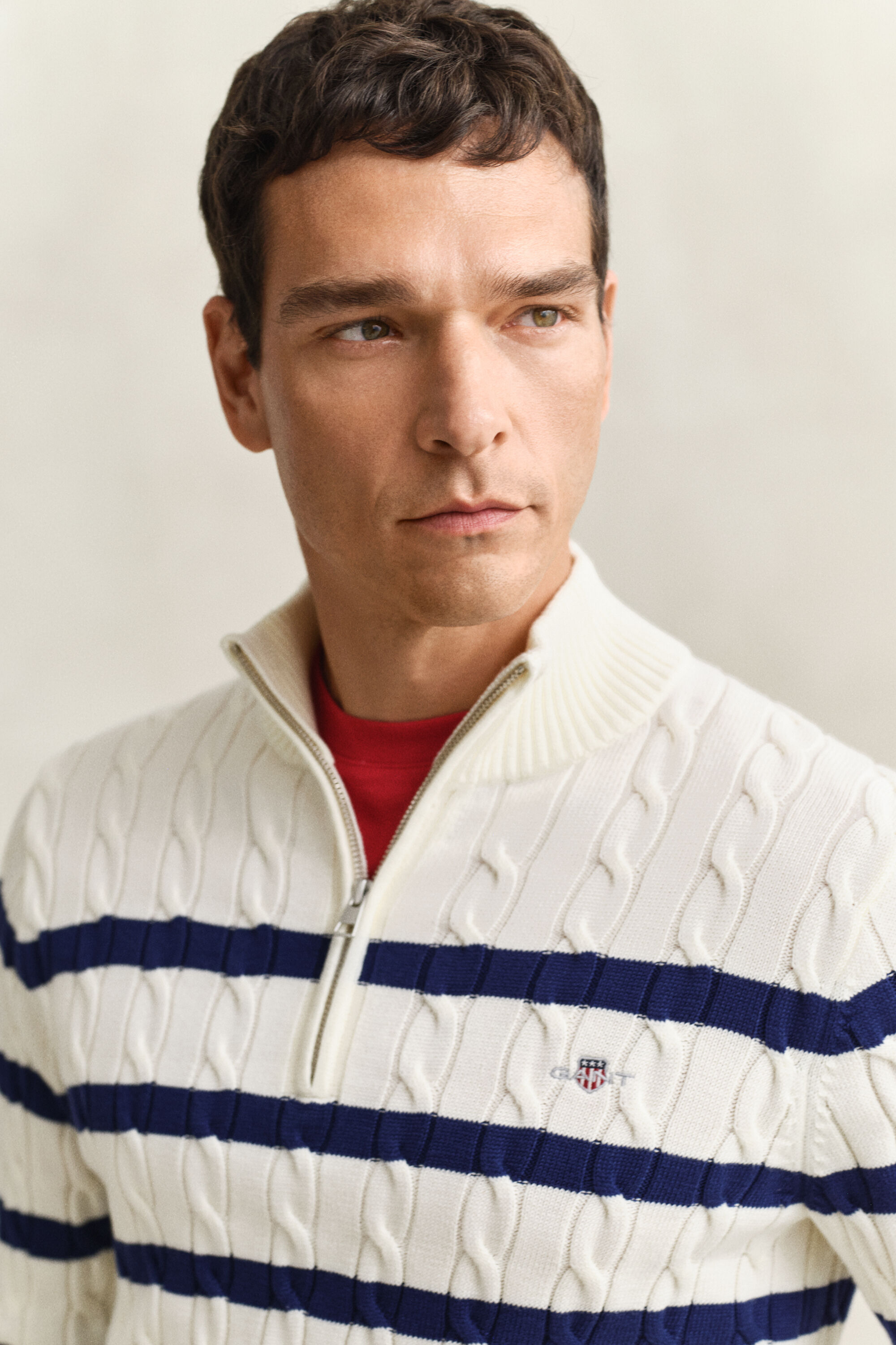 Maglia a righe in cotone a trecce con zip corta