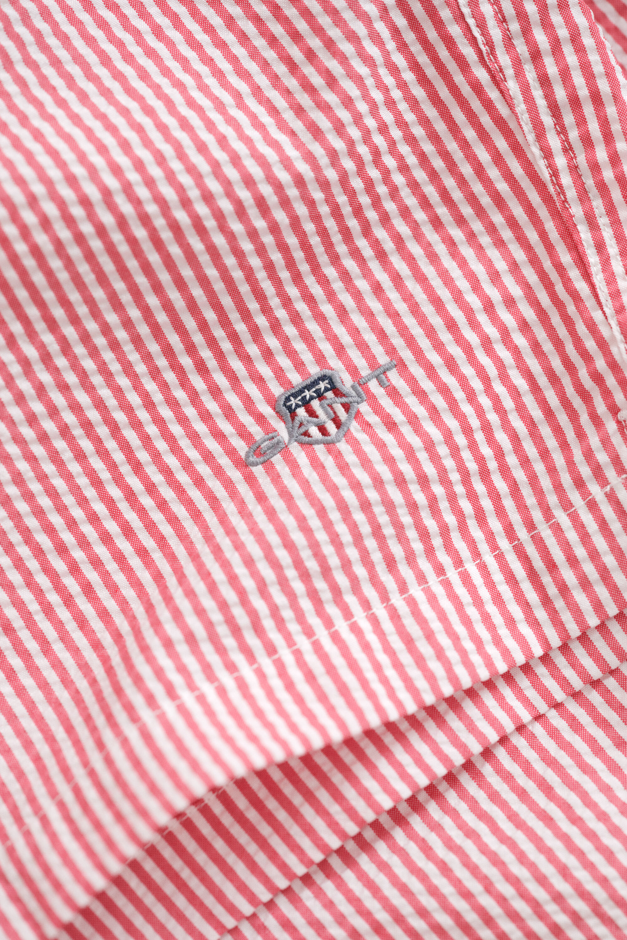 Pantaloncini da bagno in seersucker a righe