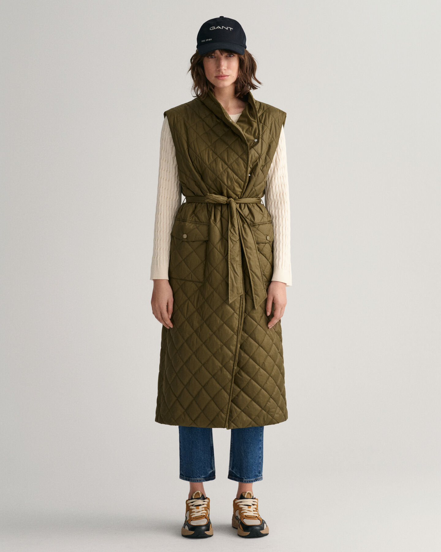 Piumino smanicato trapuntato lungo