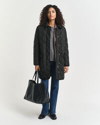 Cappotto trapuntato con finiture in velluto a coste