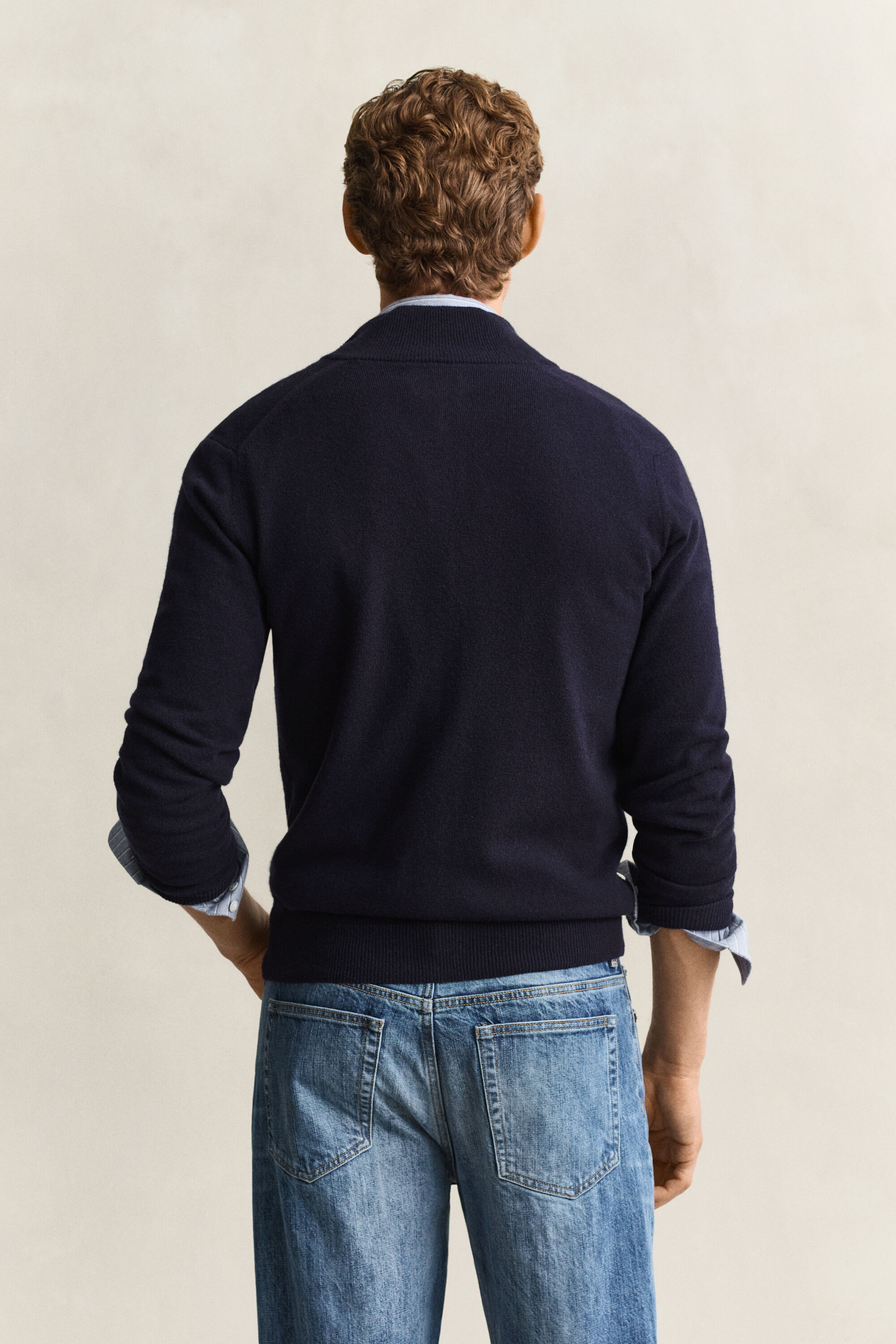 Cardigan con zip in lana d’agnello