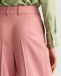 Pantaloni ampi a vita alta con piega