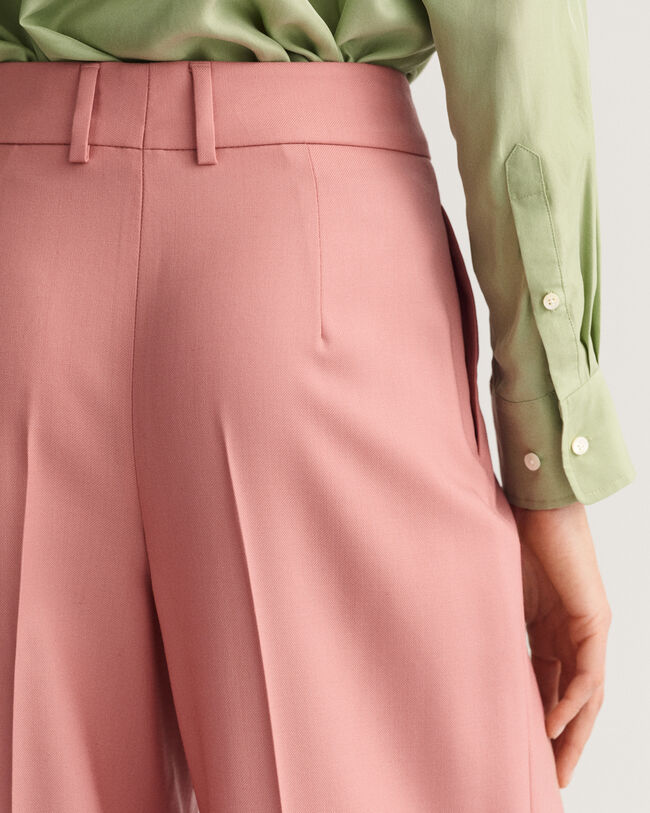 Pantaloni ampi a vita alta con piega