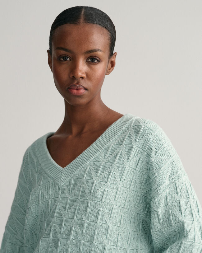 Maglia con motivo a spina di pesce con scollo a V