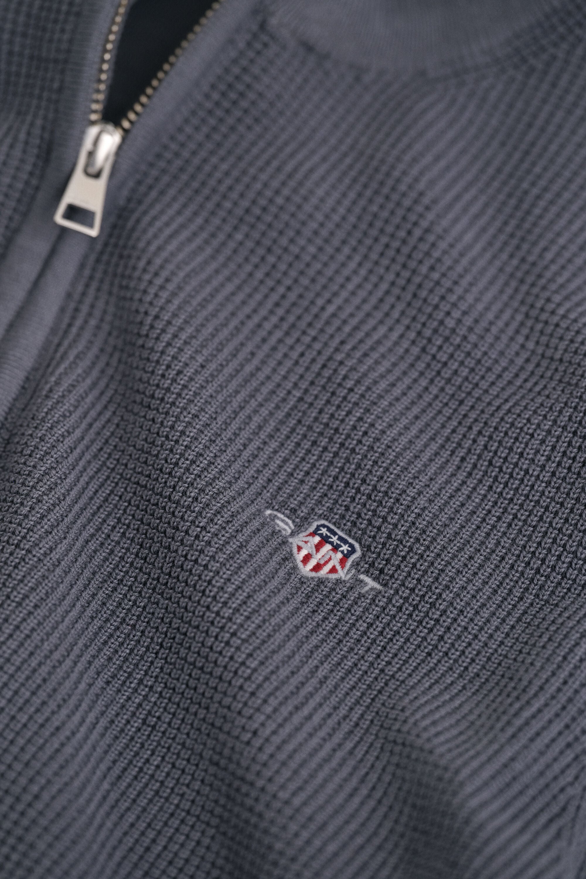 Maglia in cotone testurizzato con zip corta