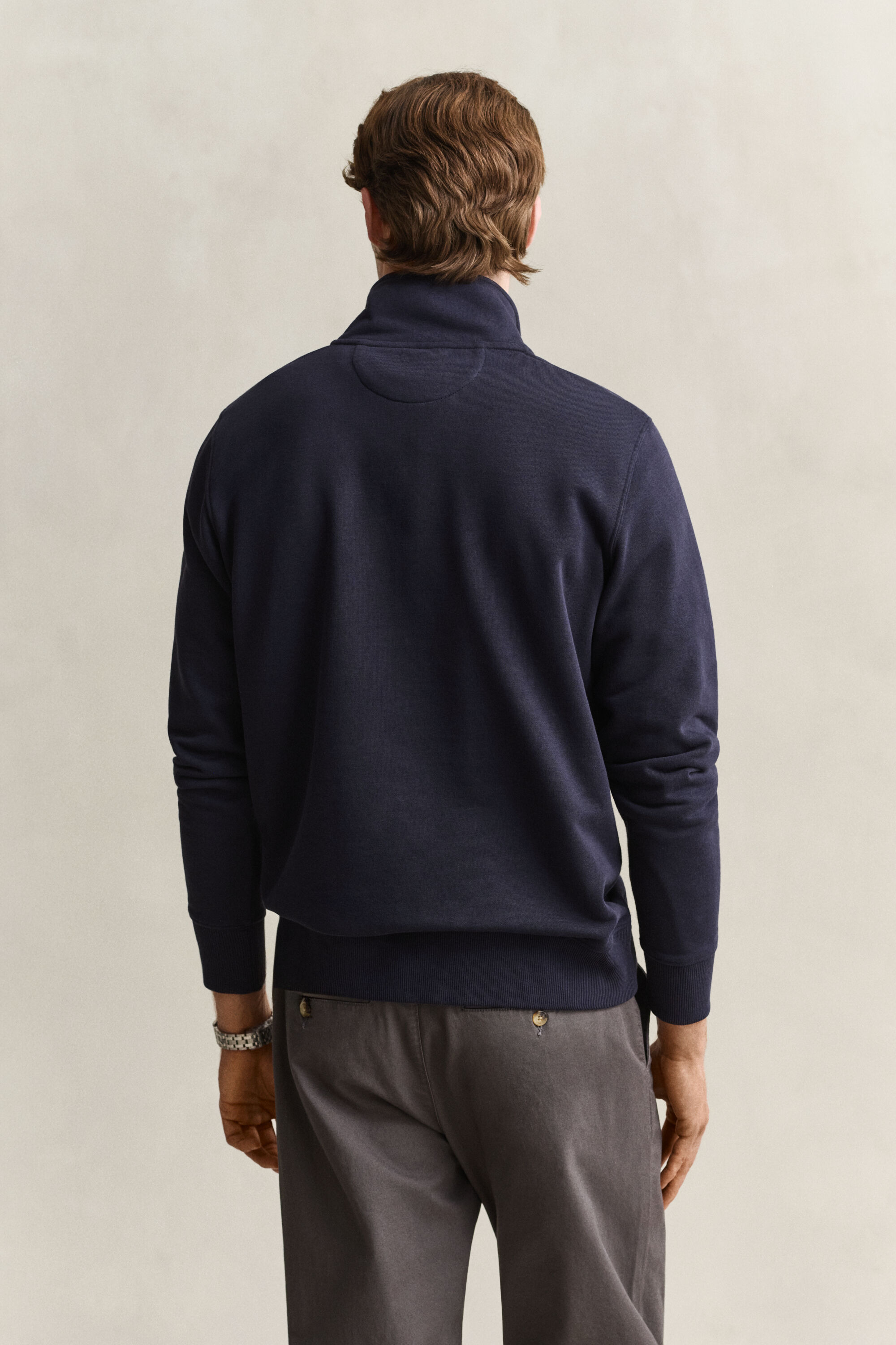 Felpa Shield con zip corta
