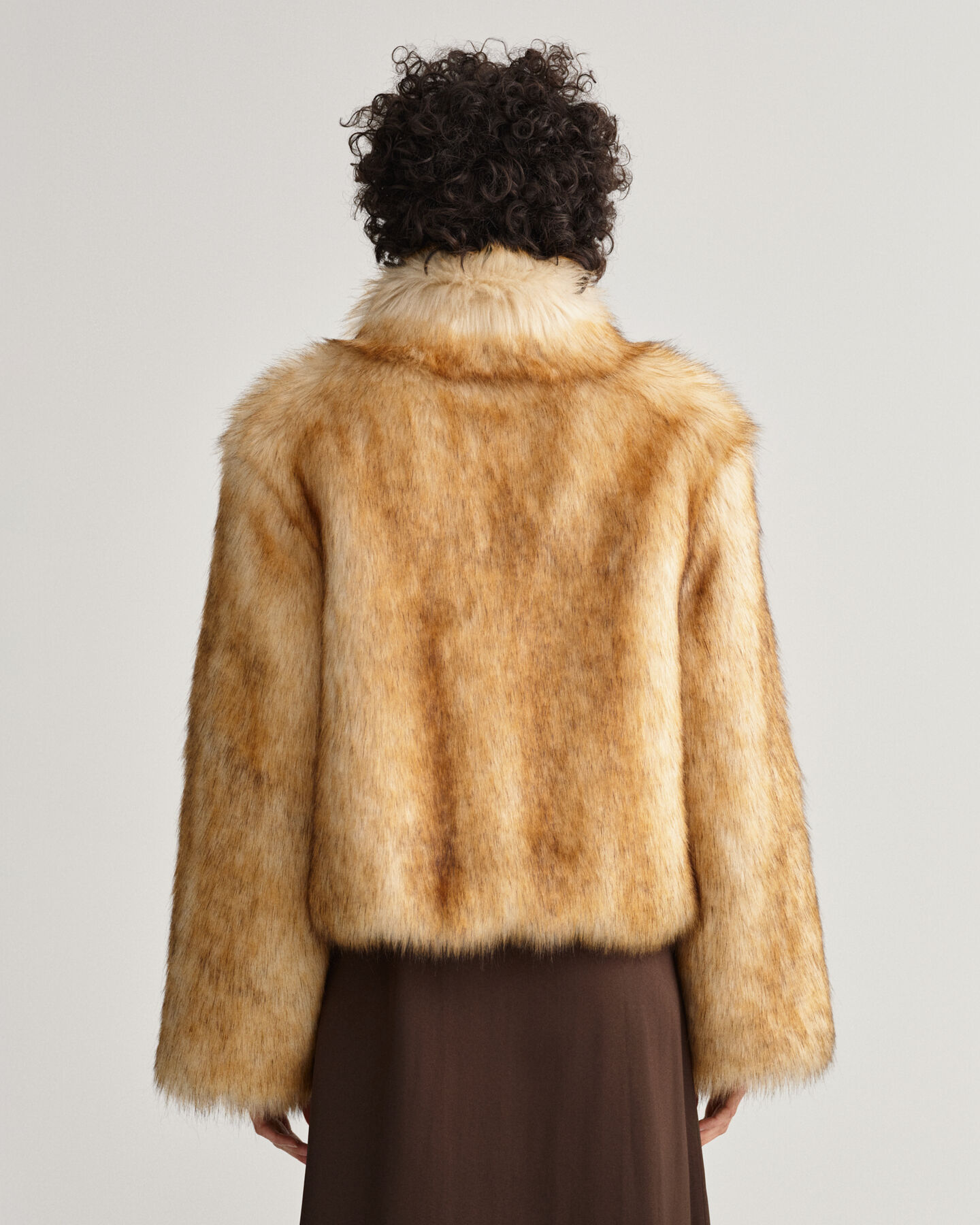 Giacca corta in eco pelliccia