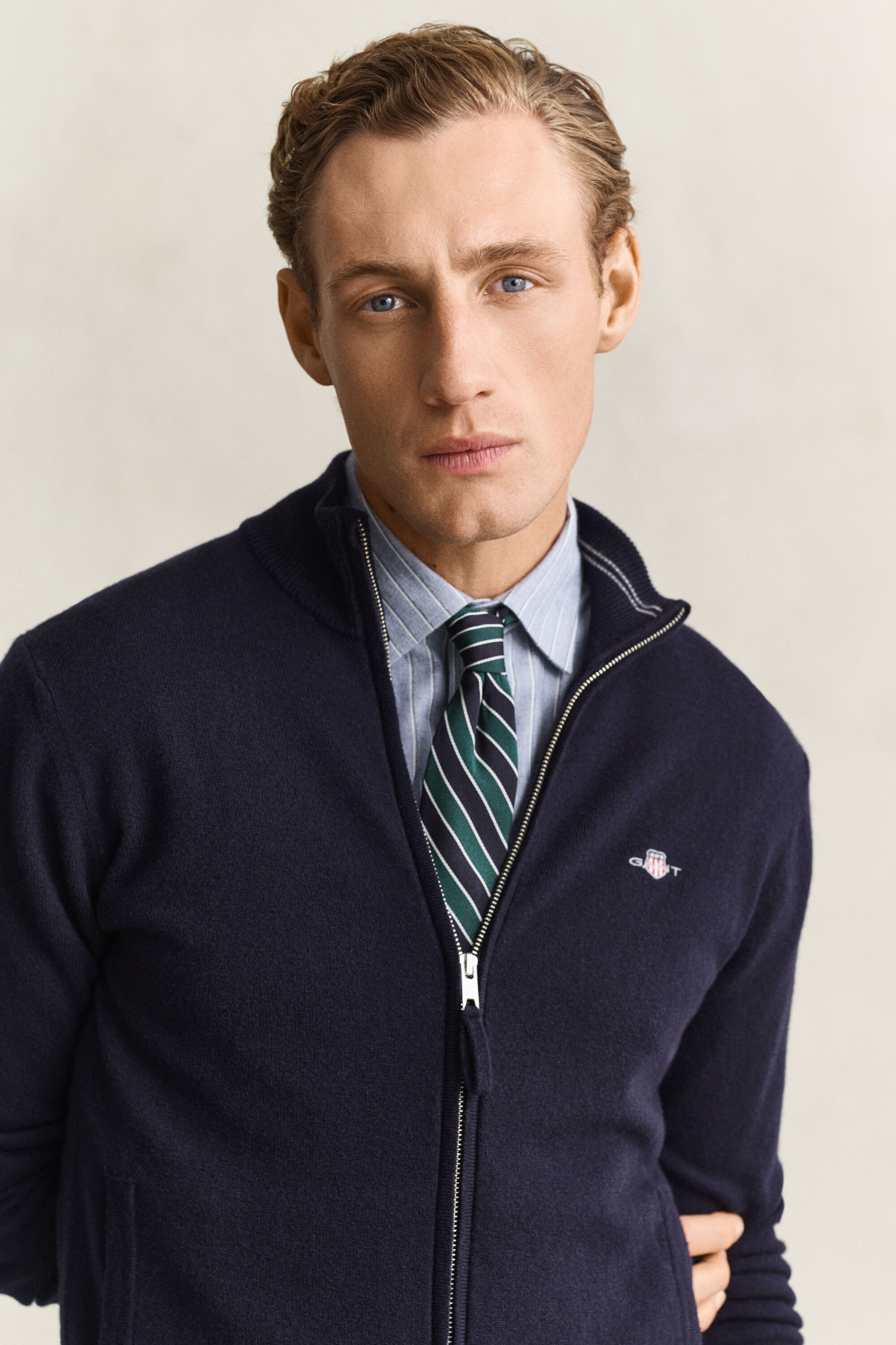 Cardigan con zip in lana d’agnello