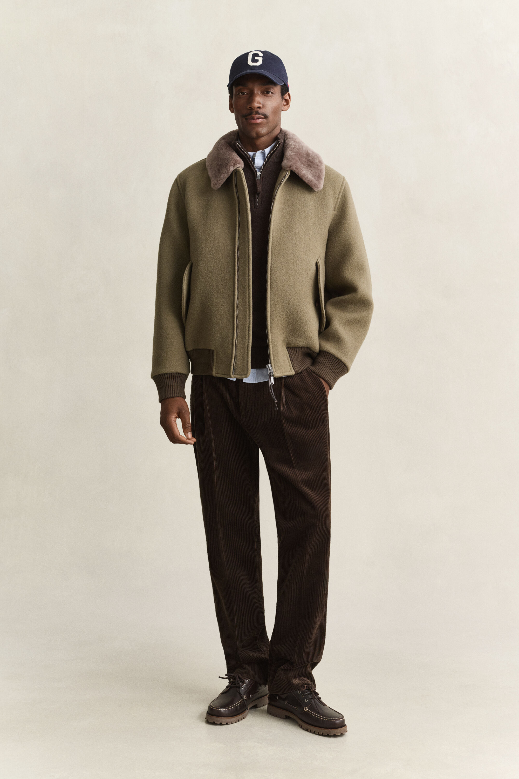 Maglia in lana d’agnello con zip corta