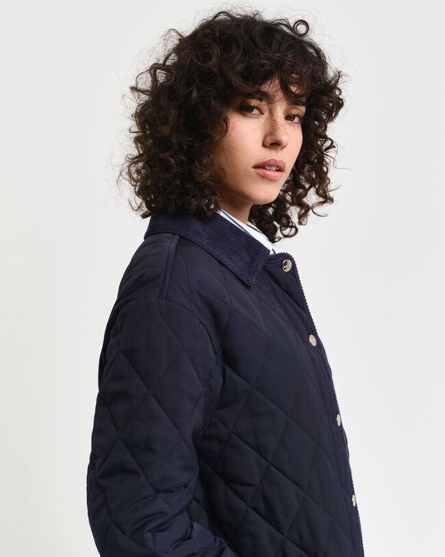 Piumino trapuntato con dettagli in velluto a coste