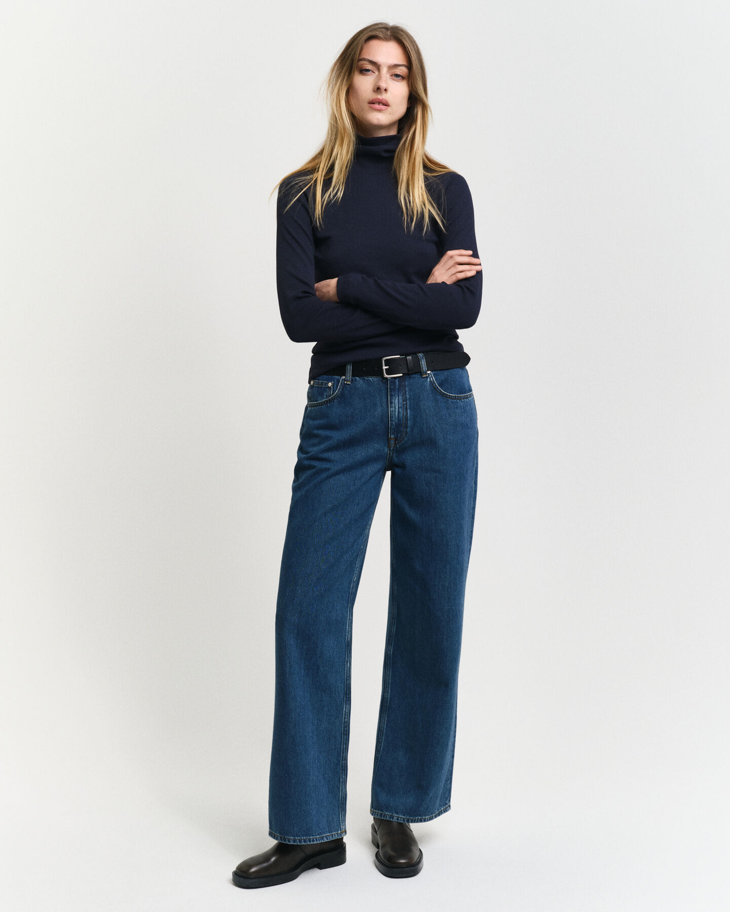 Collo alto e maniche lunghe a coste