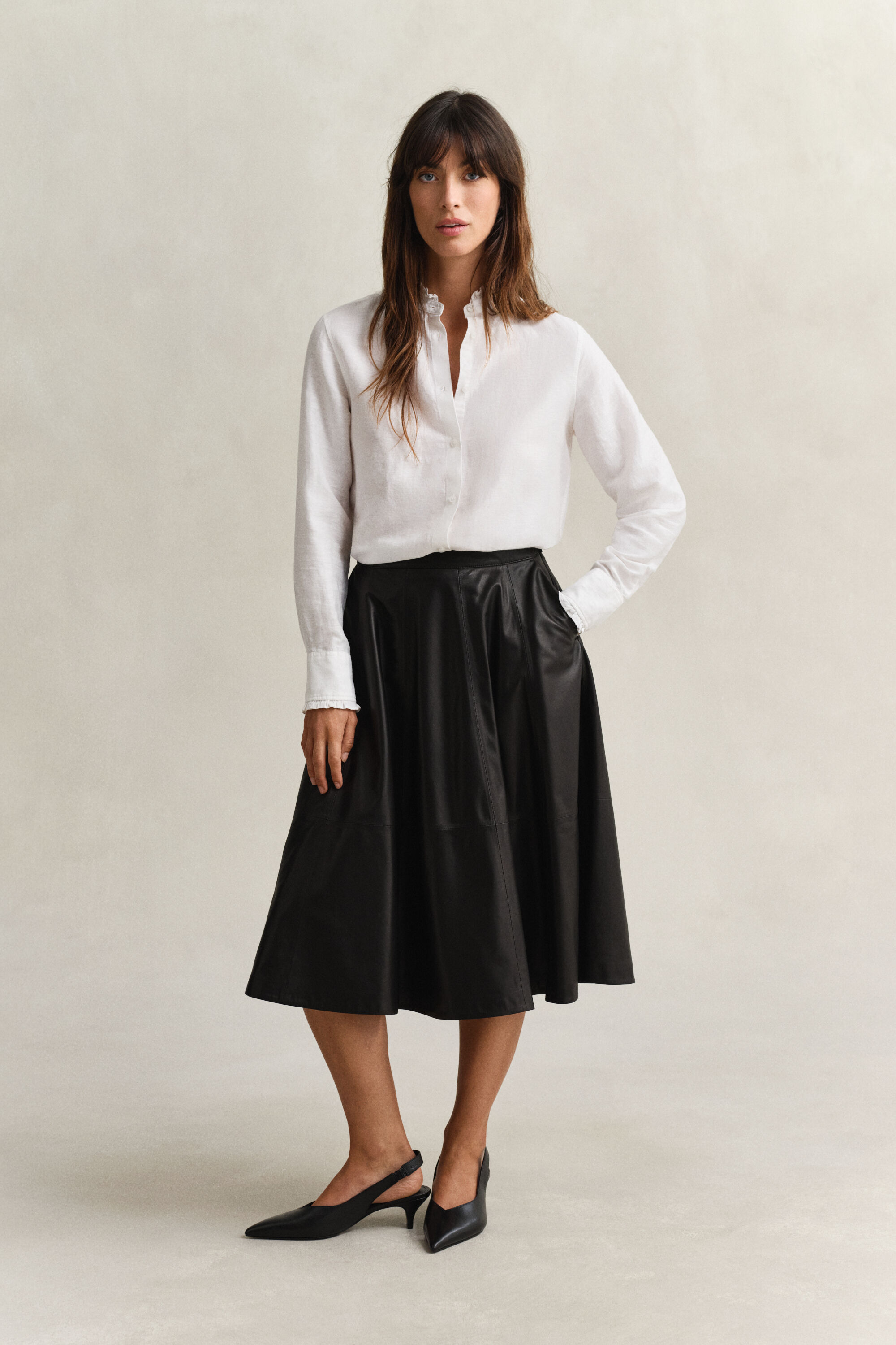 Blusa in misto lino con volant