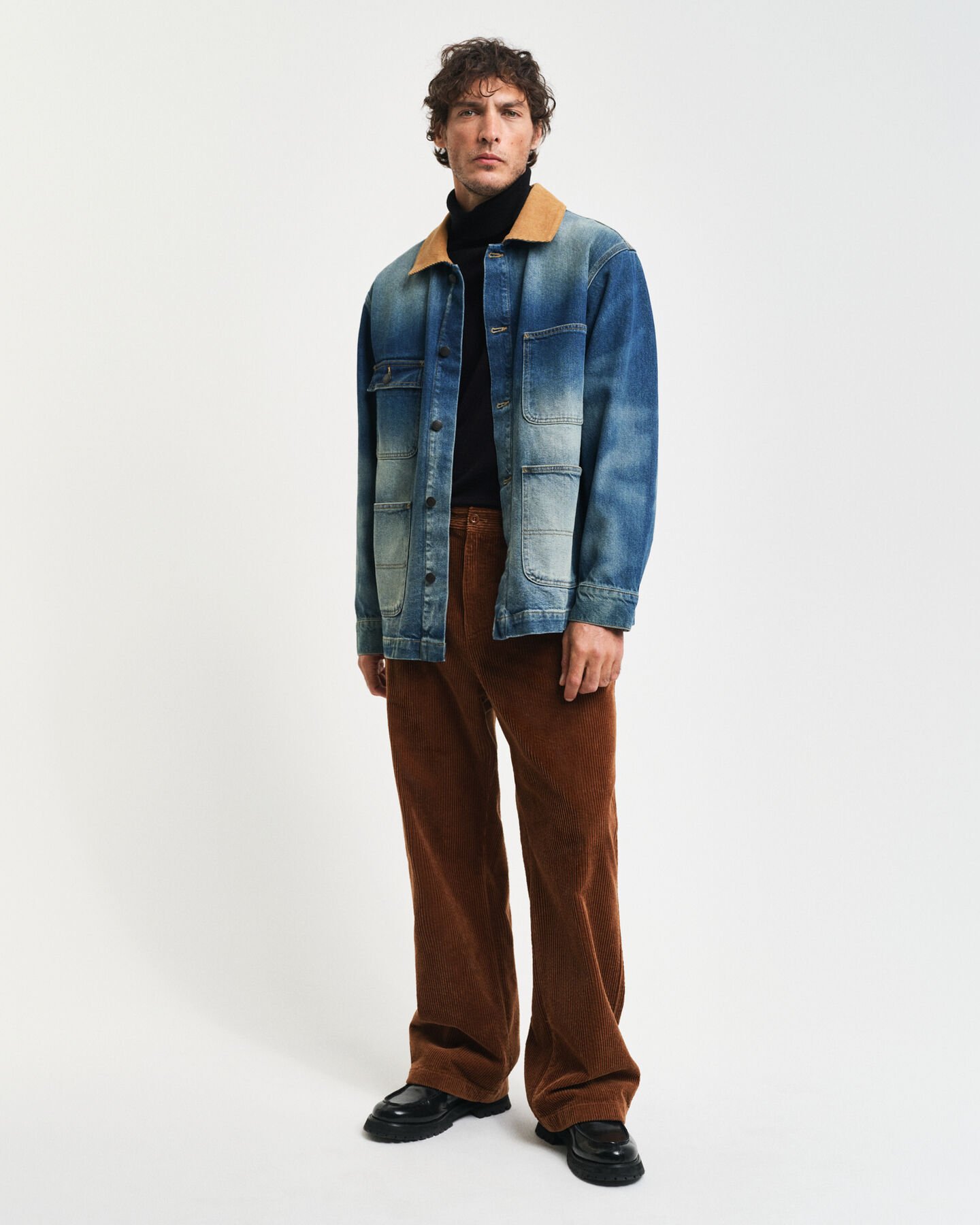 Maglia a collo alto in finissima lana merino