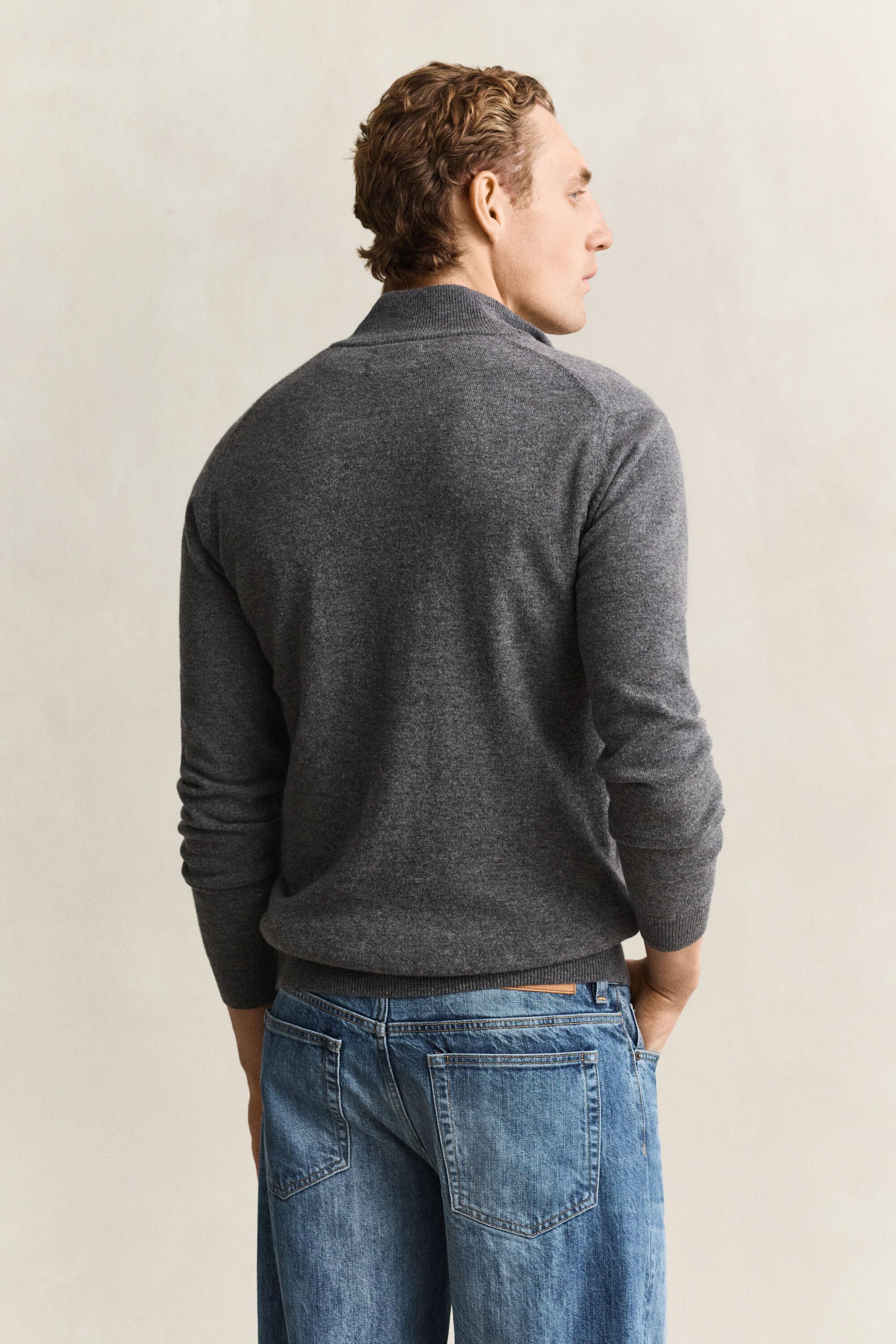 Cardigan con zip in lana d’agnello