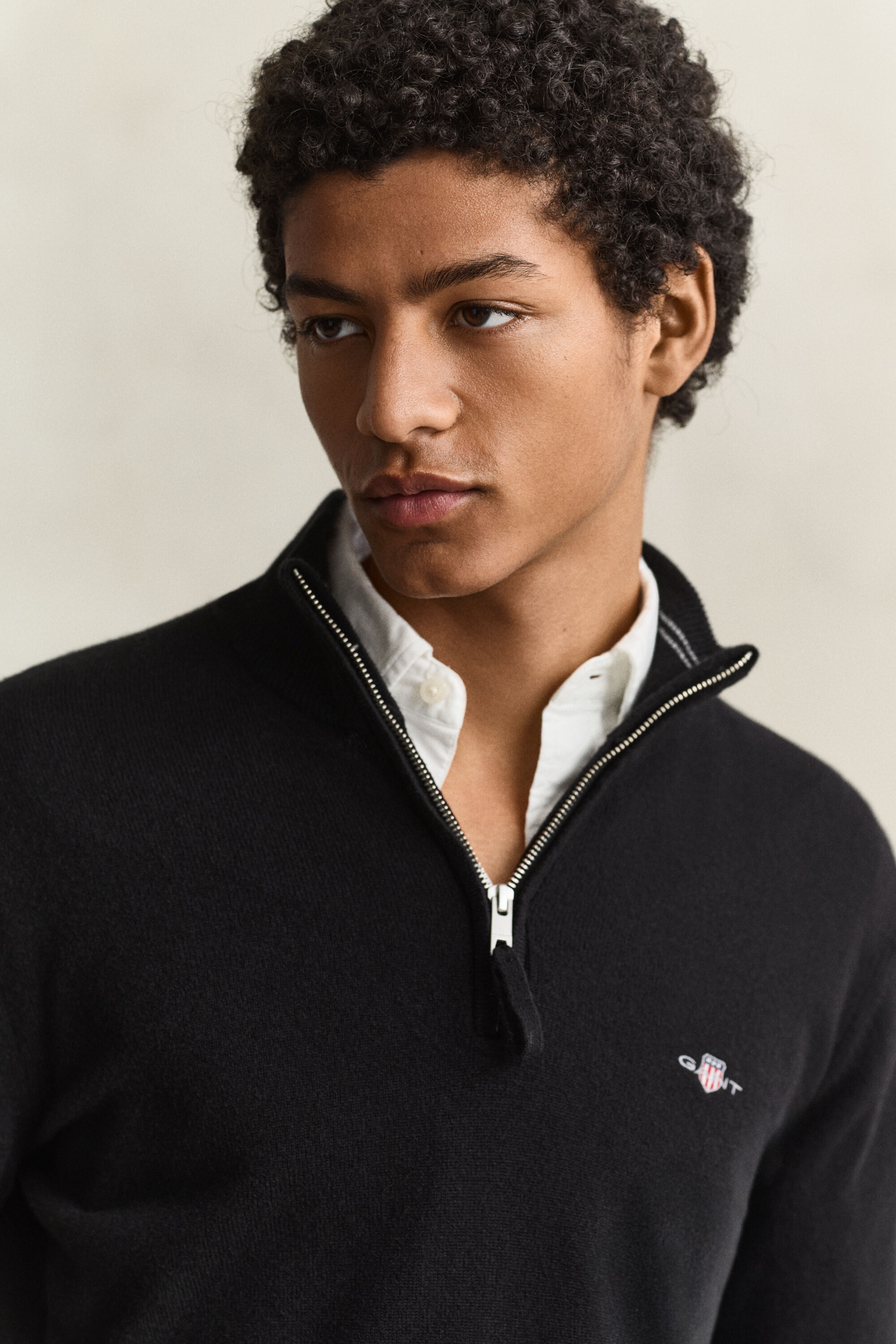 Maglia in lana d’agnello con zip corta
