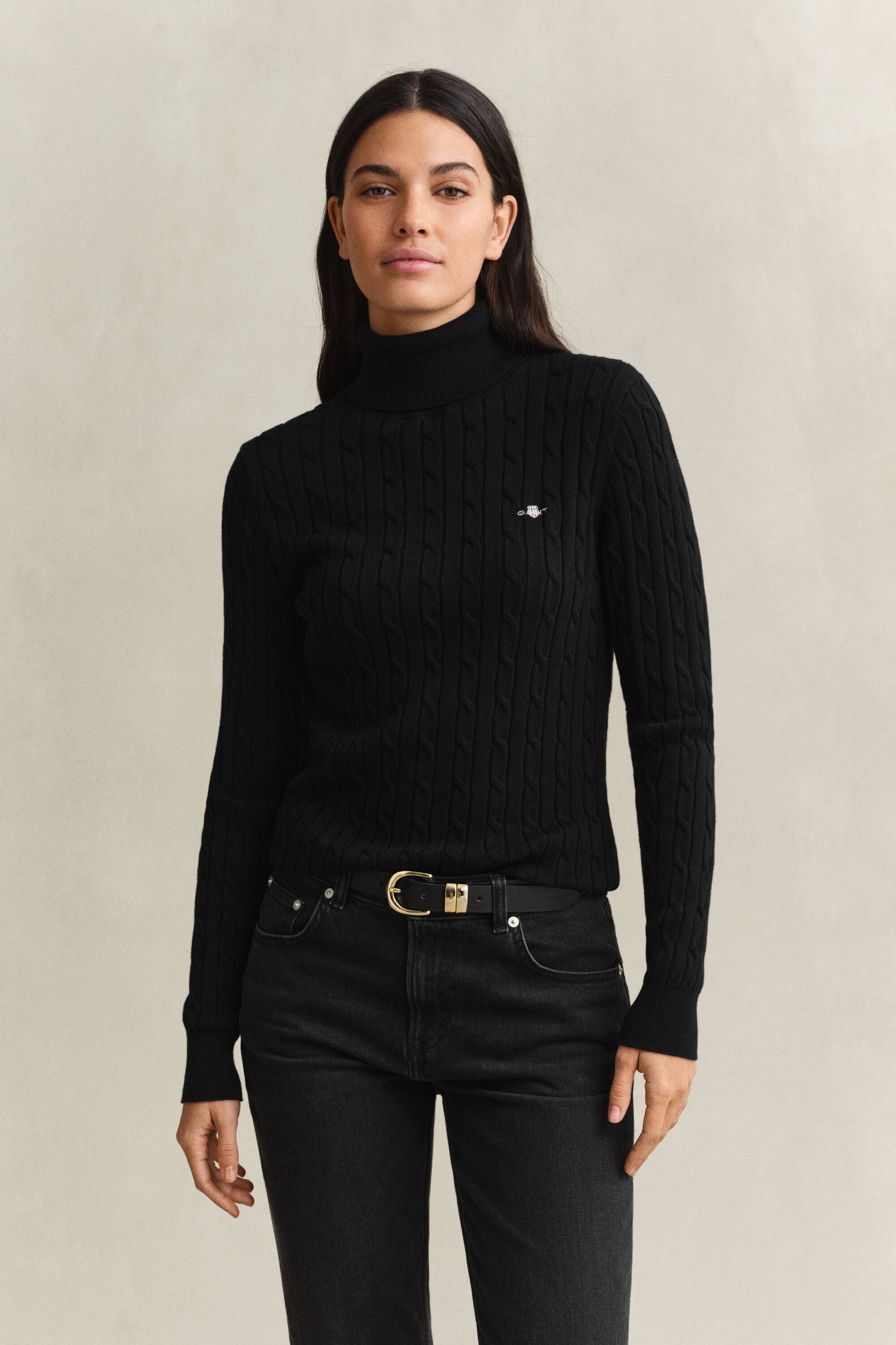 Maglia a collo alto in cotone elasticizzato a trecce