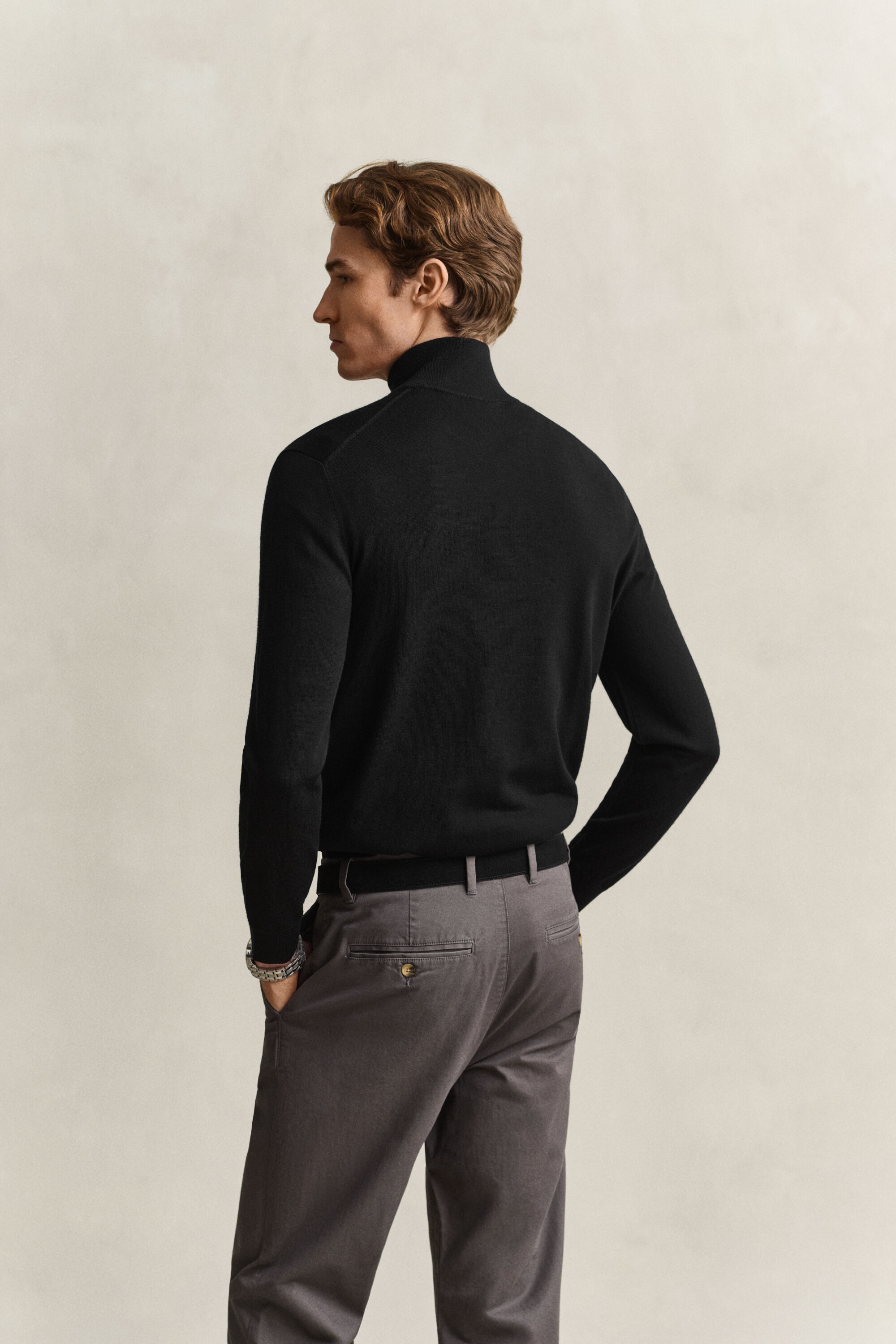 Maglia in lana merino a coste con zip corta