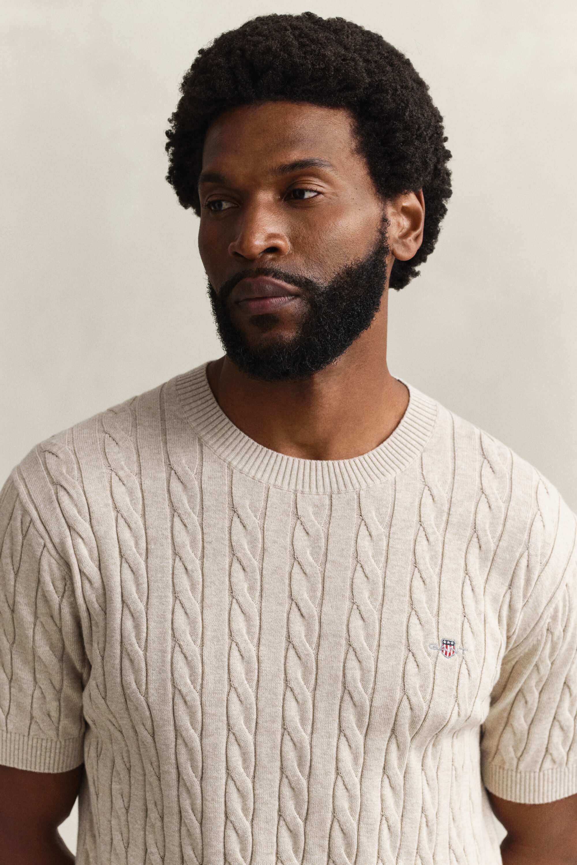 Maglia a trecce con maniche corte in cotone