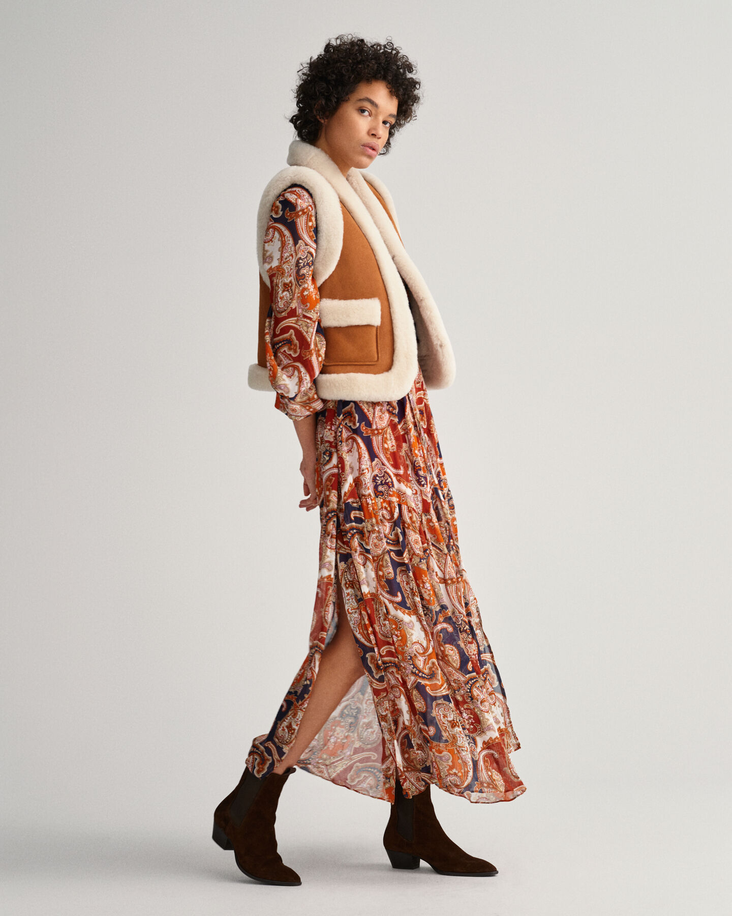 Piumino smanicato in shearling