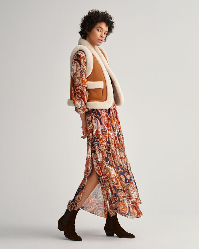 Piumino smanicato in shearling