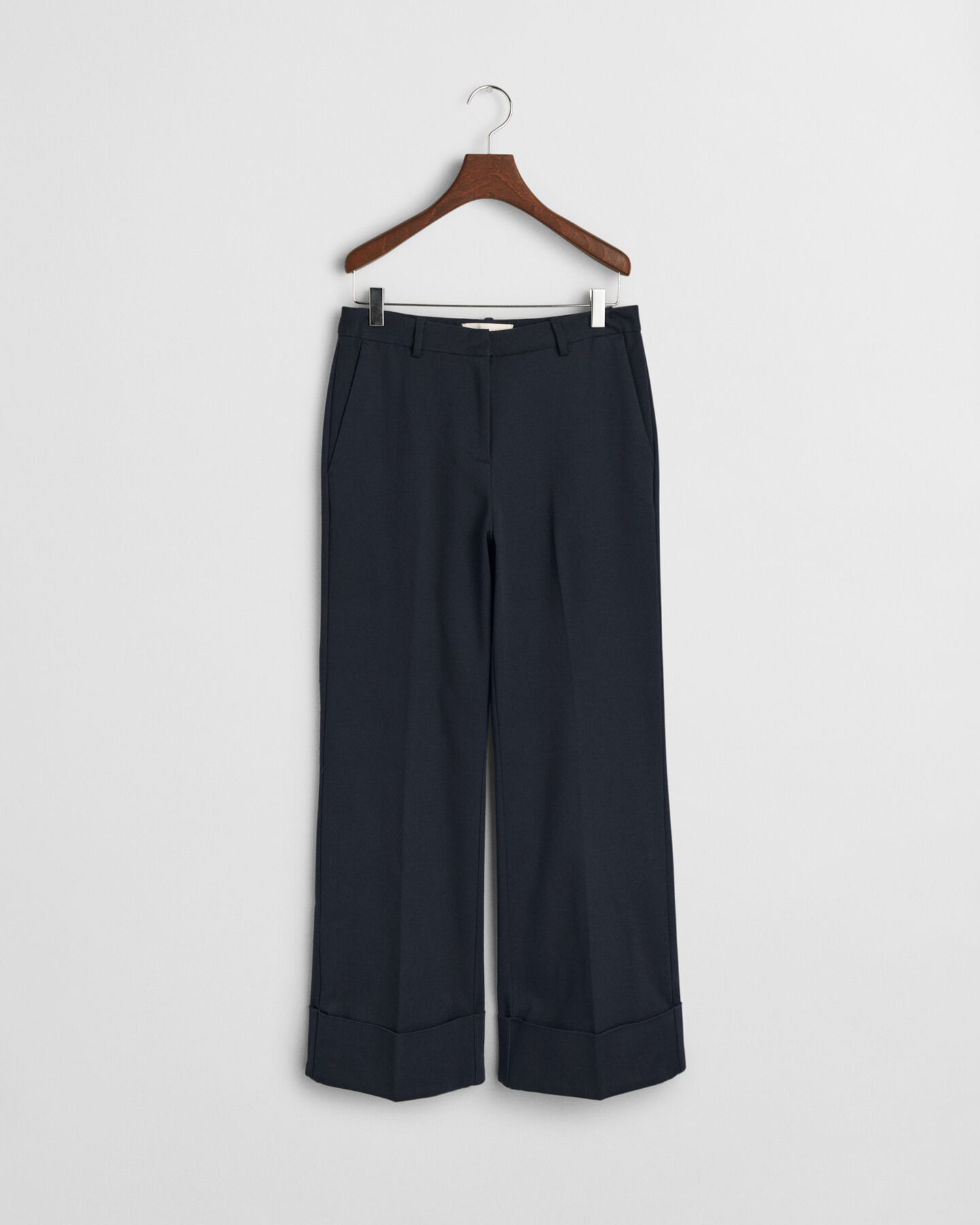 Pantaloni con piega e risvolto