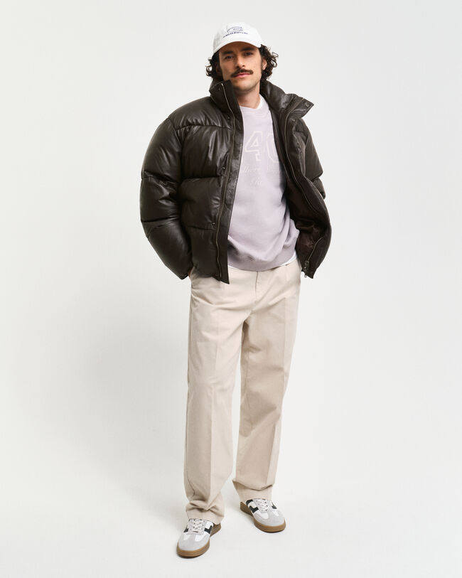 Piumino in pelle imbottito di piuma d’oca