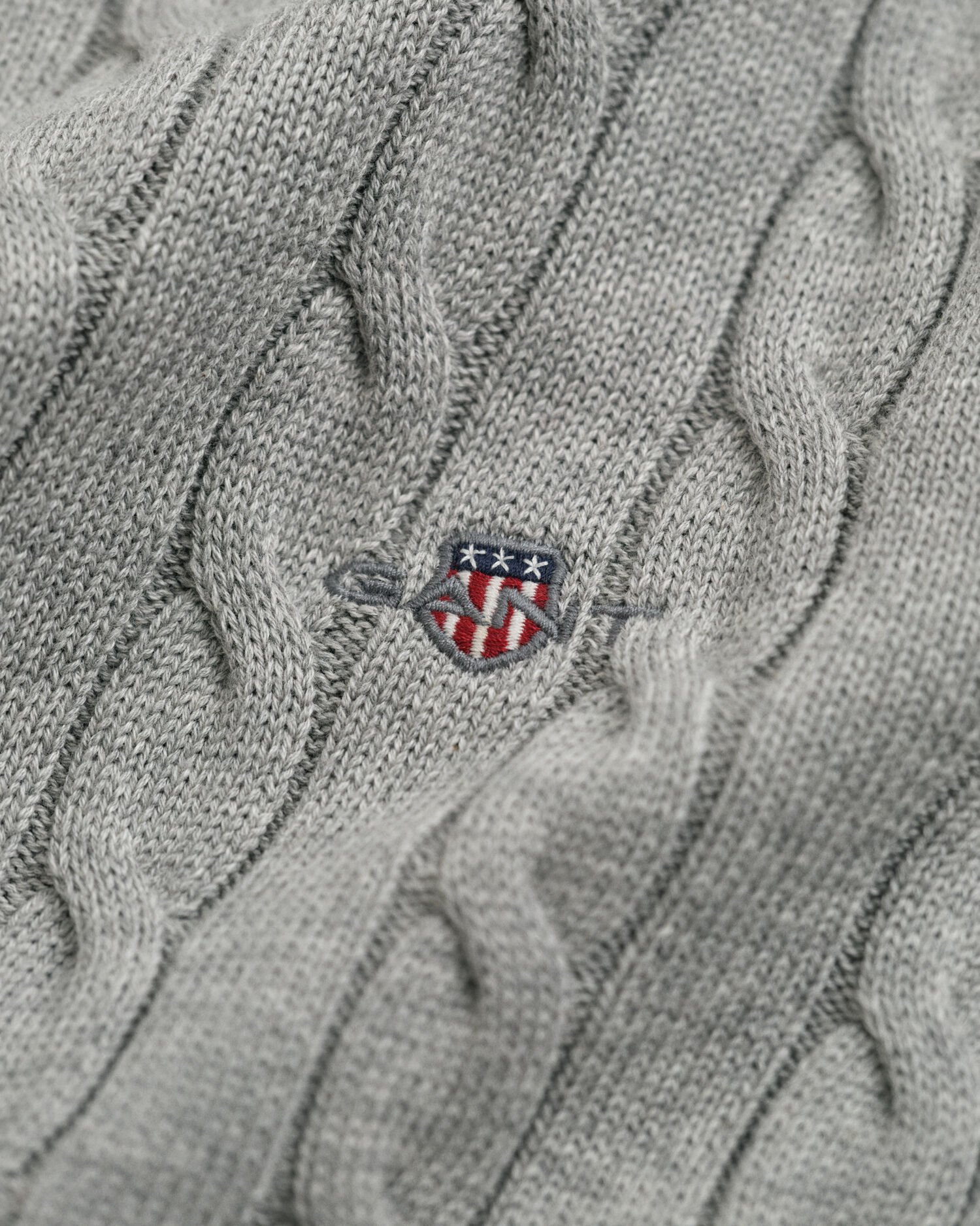 Maglia a collo alto in cotone a trecce