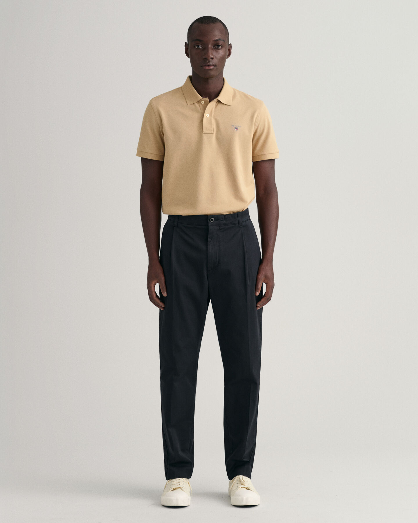 Pantaloni con piega stretti in fondo