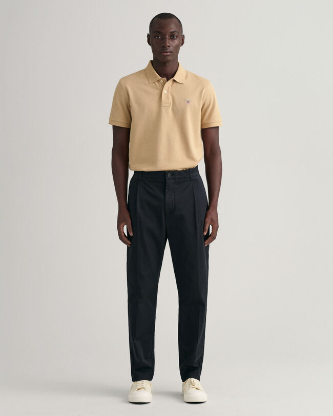 Pantaloni con piega stretti in fondo