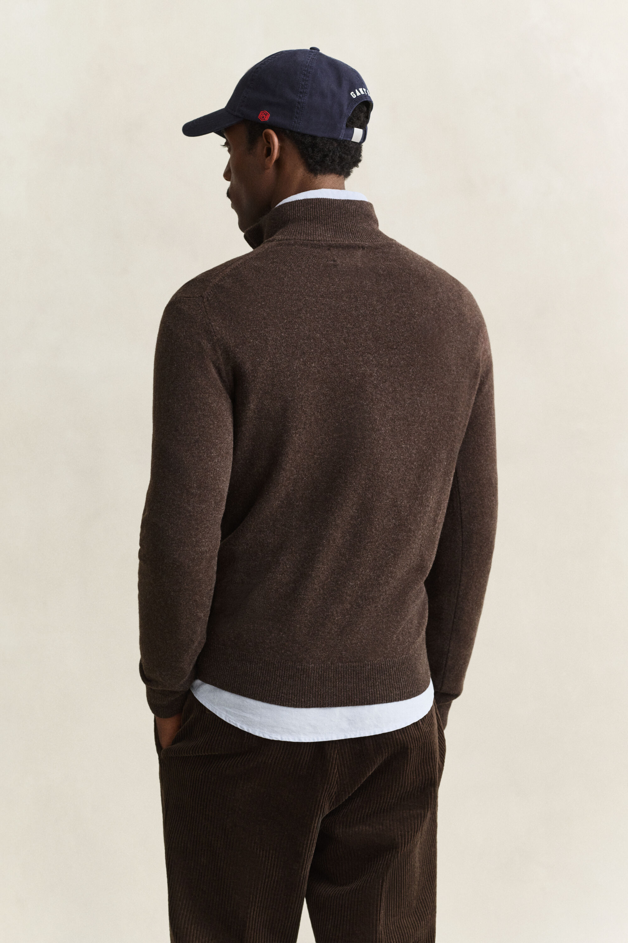 Maglia in lana d’agnello con zip corta