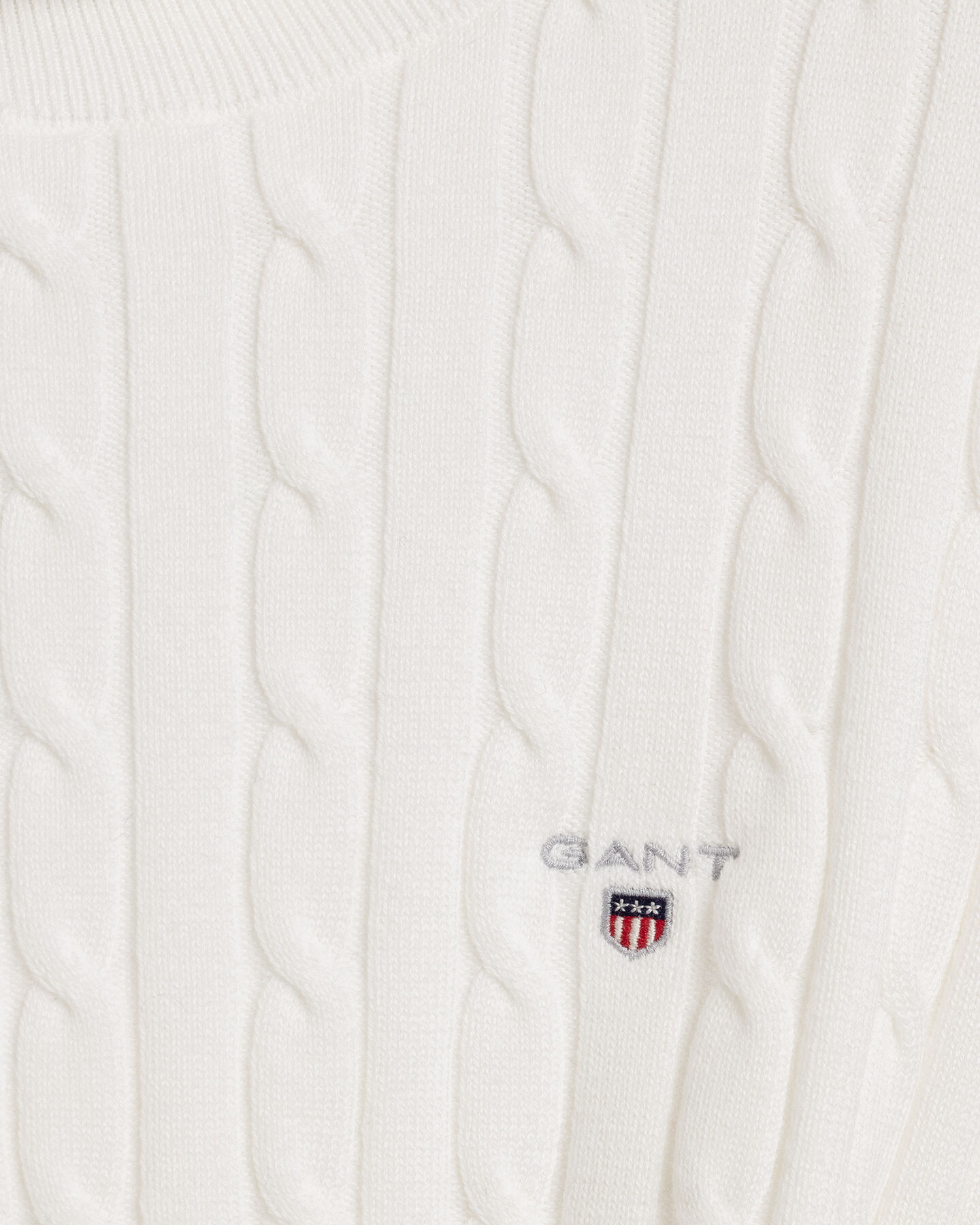 Maglia con collo alto in cotone elasticizzato a trecce