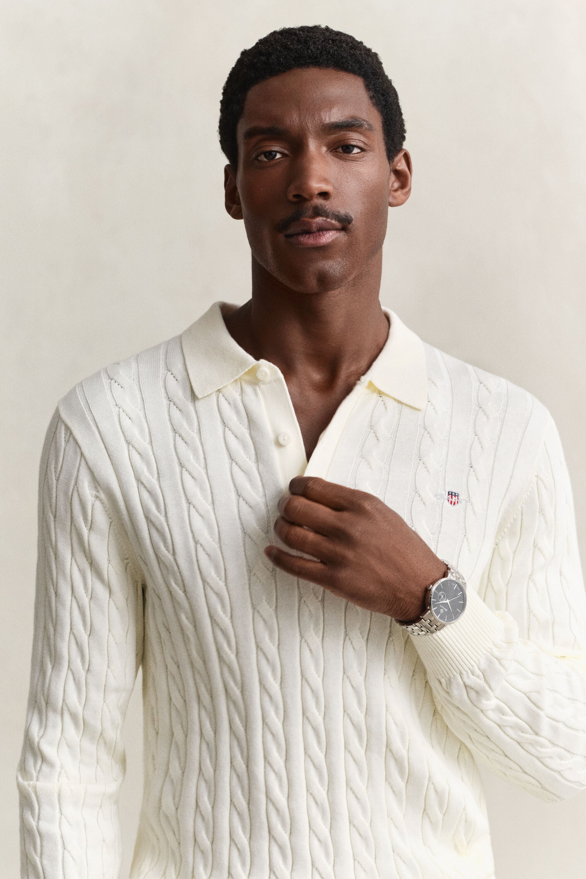 Polo in maglia a trecce in cotone