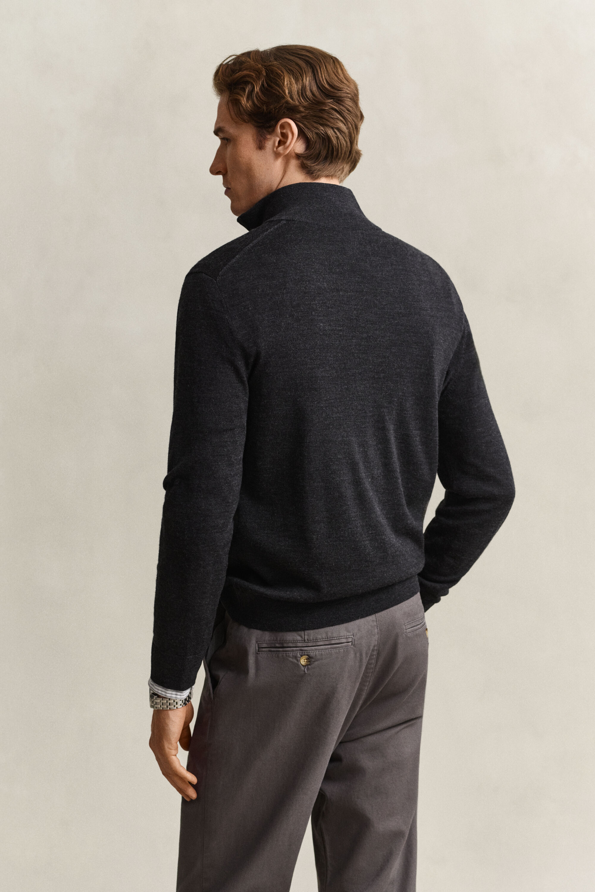 Maglia in lana merino a coste con zip corta