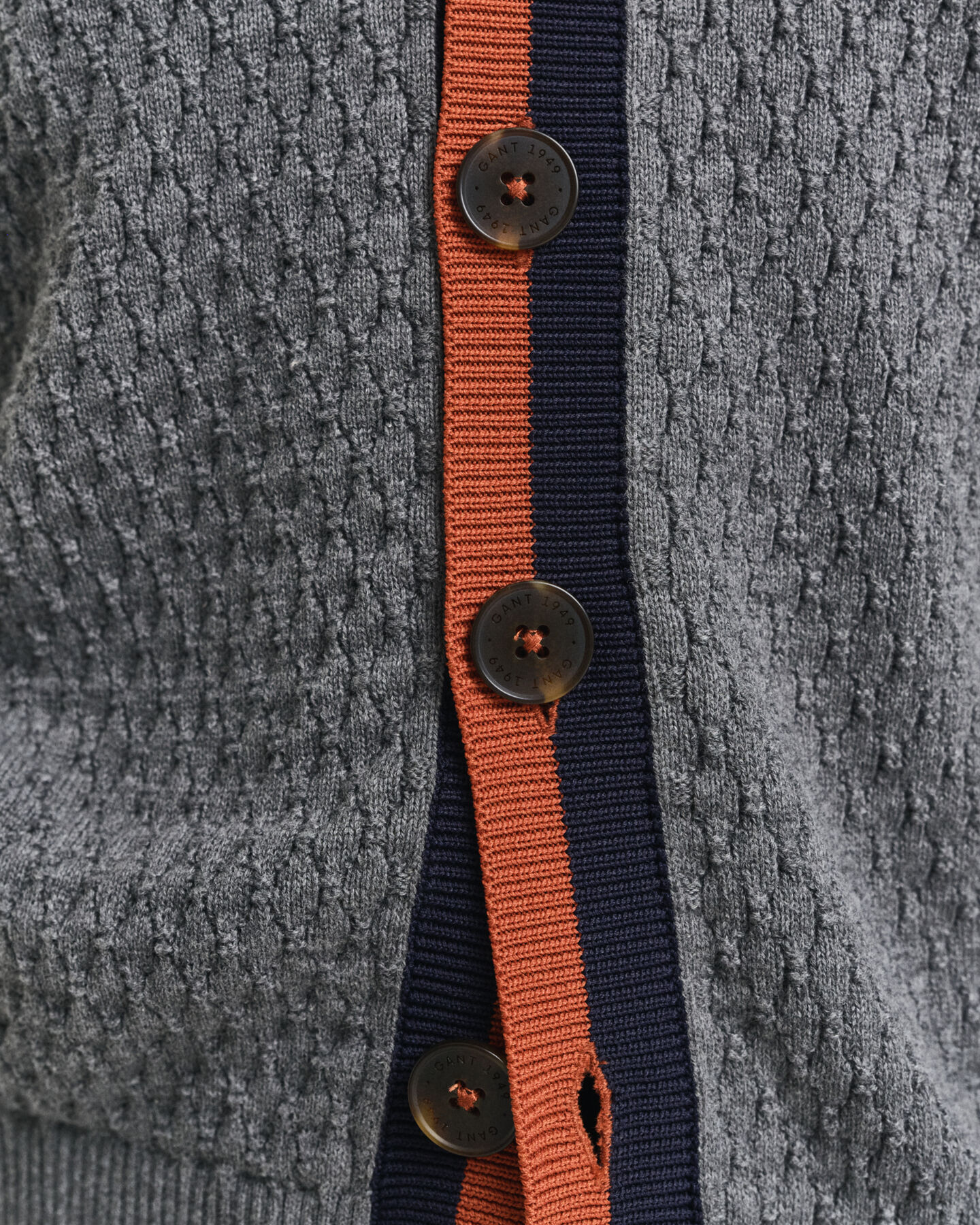 Cardigan in cotone testurizzato in un colore a contrasto