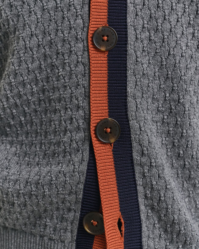 Cardigan in cotone testurizzato in un colore a contrasto