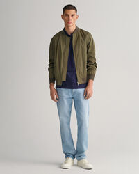 Polo in piqu&eacute; a righe con colletto a contrasto