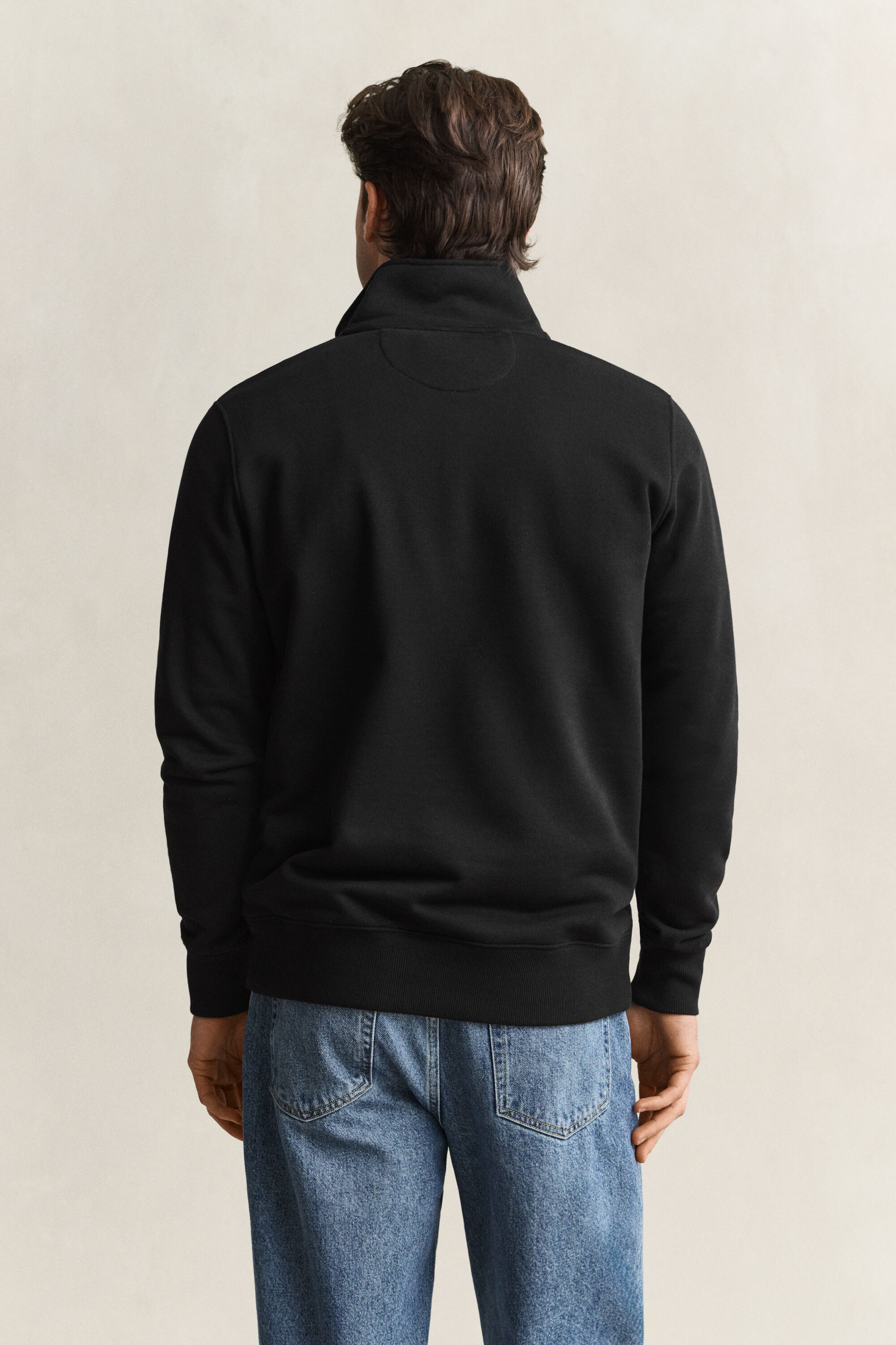 Felpa Shield con zip corta