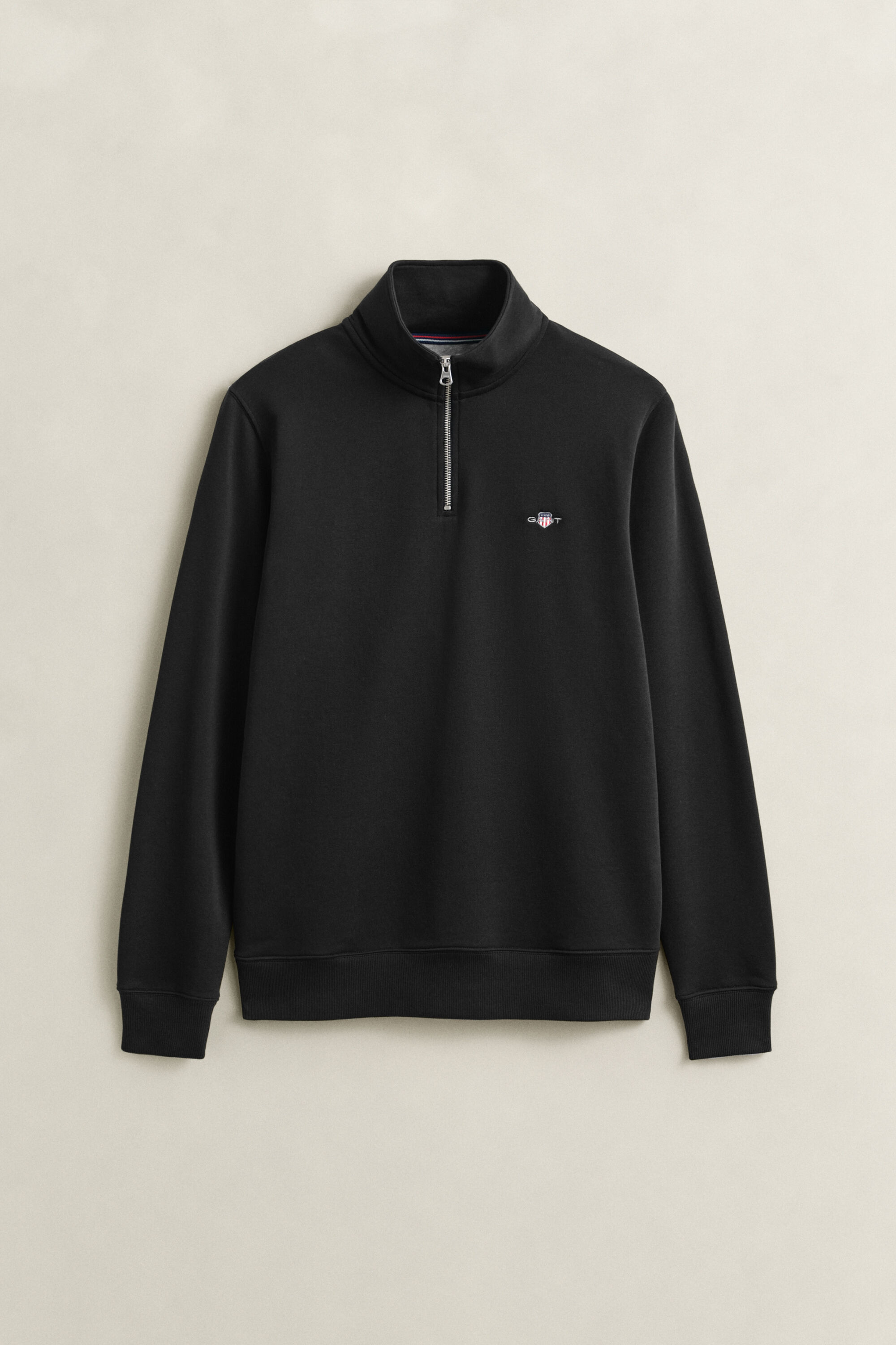 Felpa Shield con zip corta