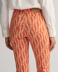 Jeans alla caviglia con stampa a catena