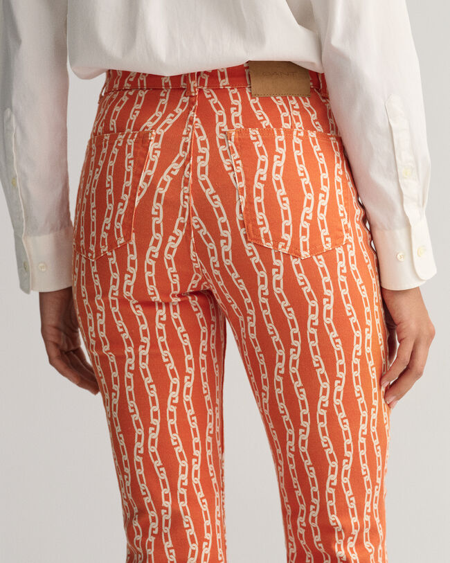 Jeans alla caviglia con stampa a catena