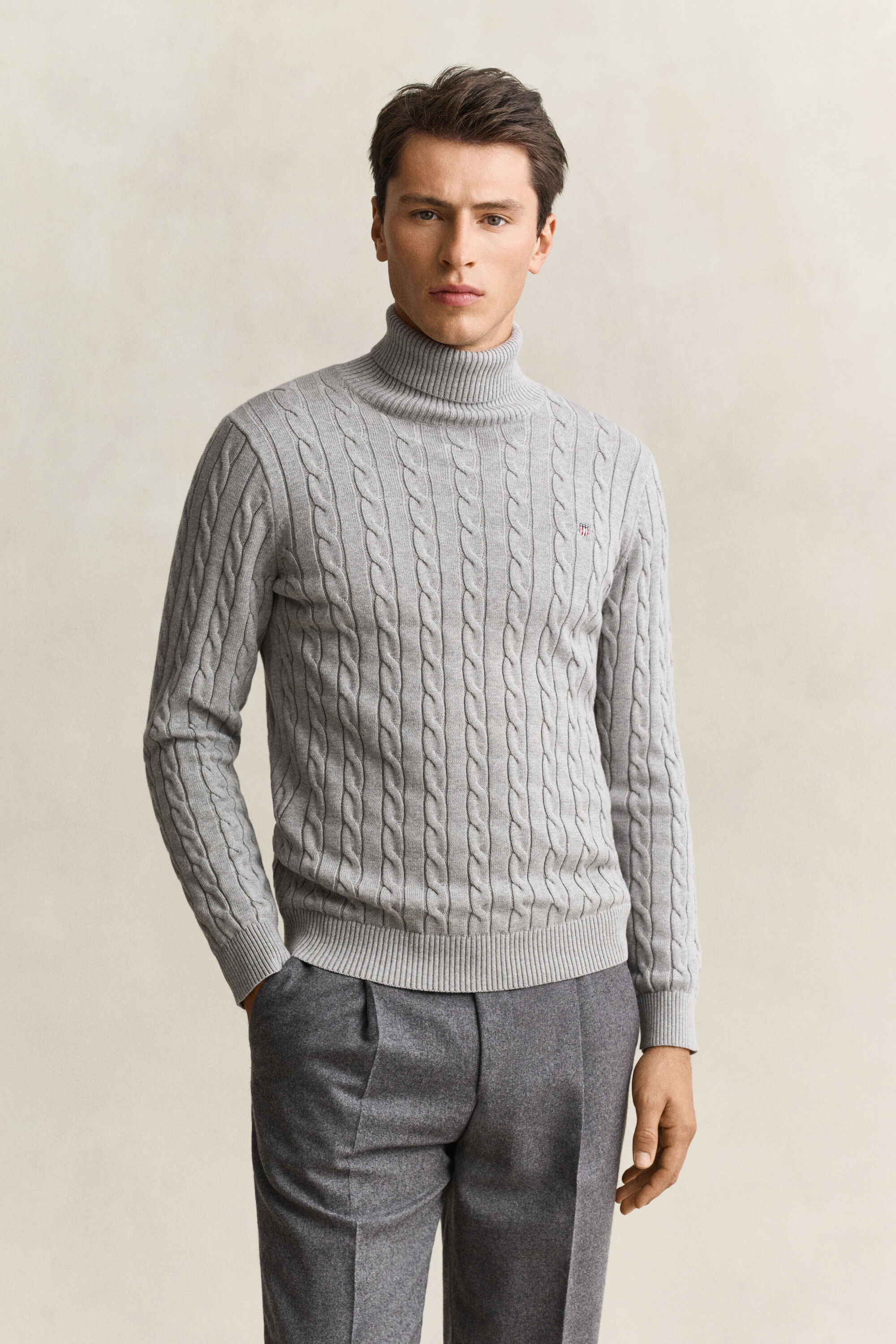Maglia a collo alto in cotone a trecce