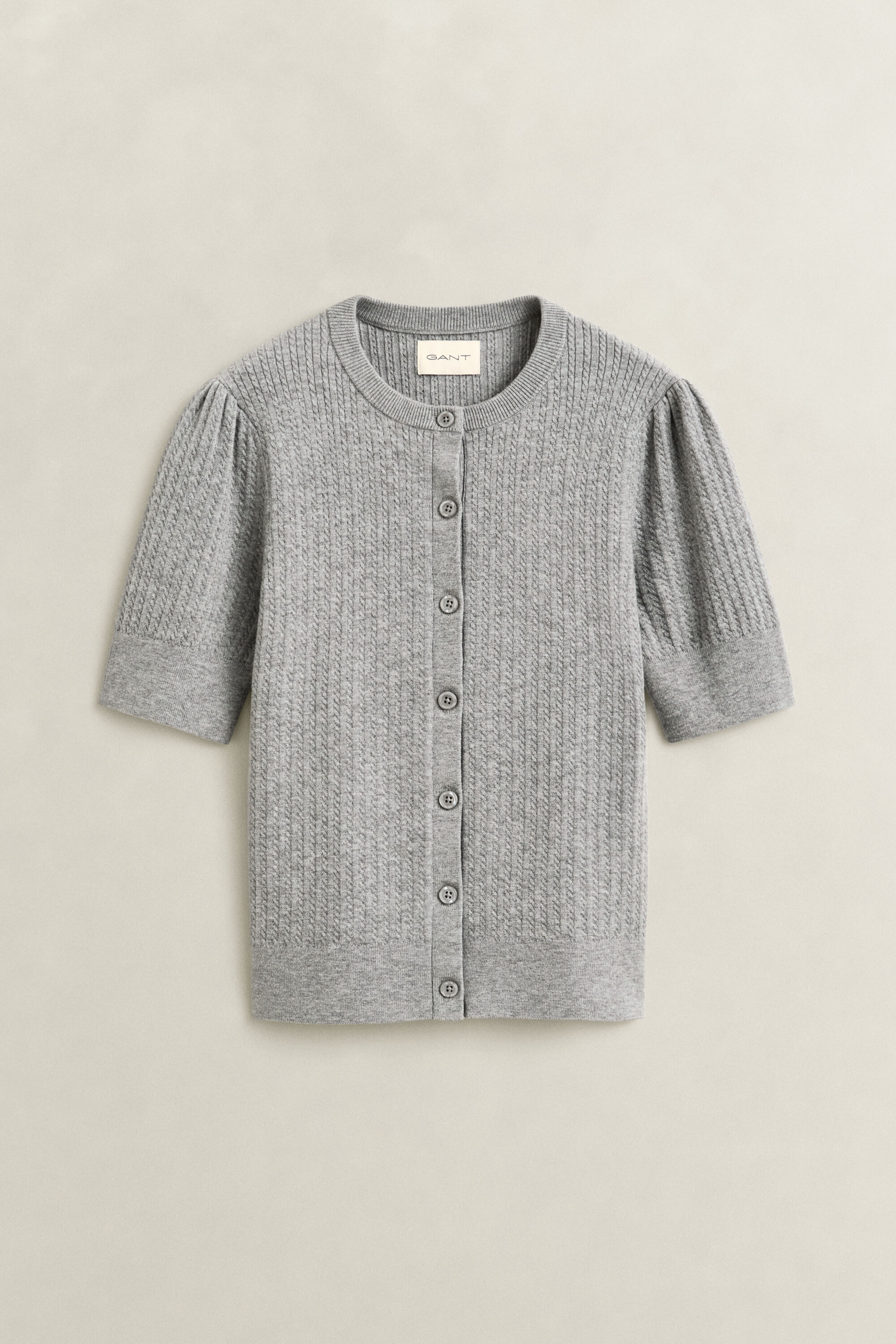 Cardigan a trecce con maniche corte