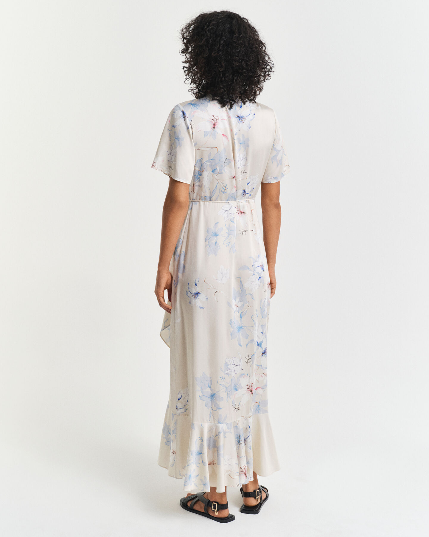 Abito a portafoglio maniche corte con volant e stampa floreale