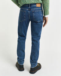 Jeans regular fit con lavaggio uniforme