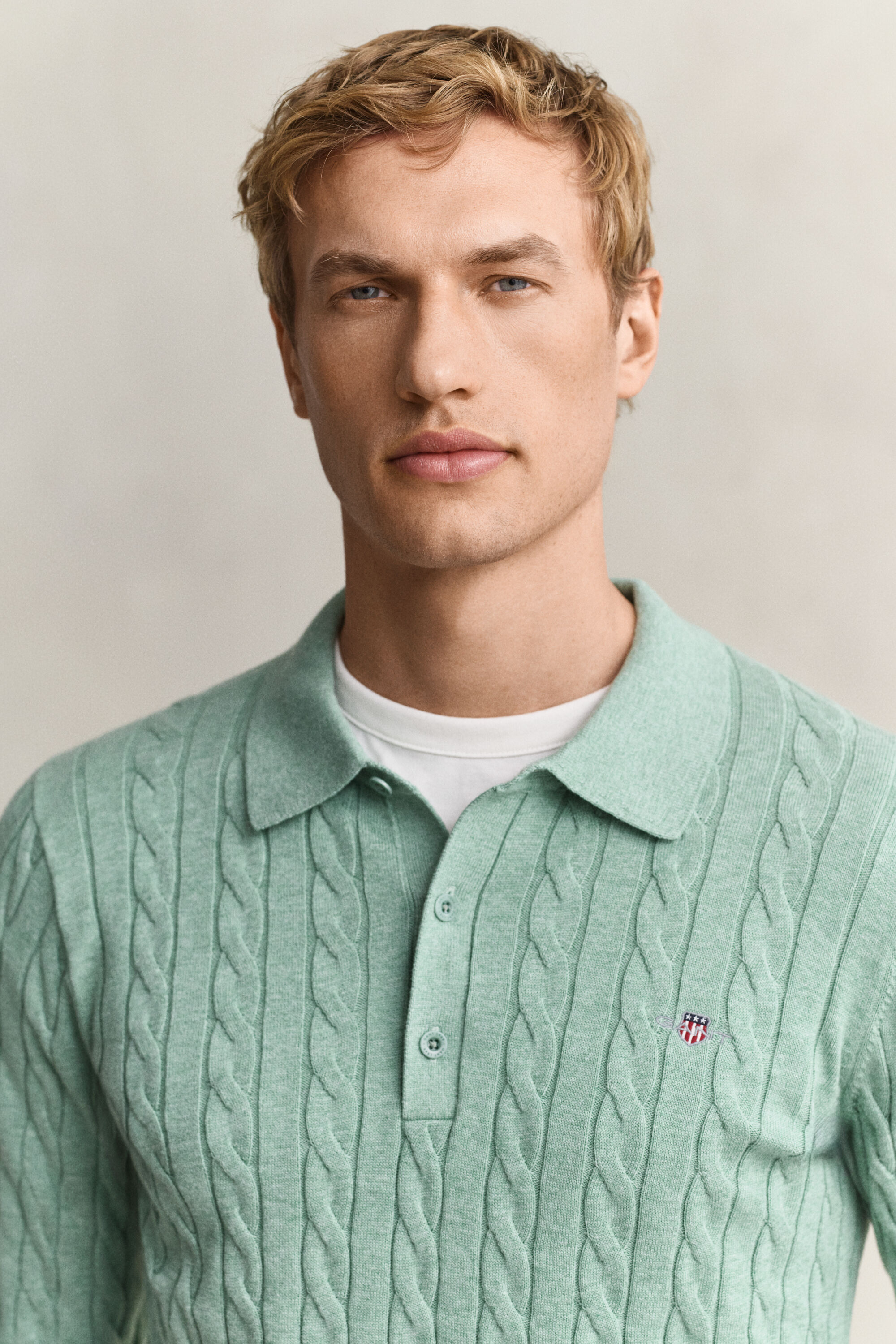 Polo in maglia a trecce in cotone