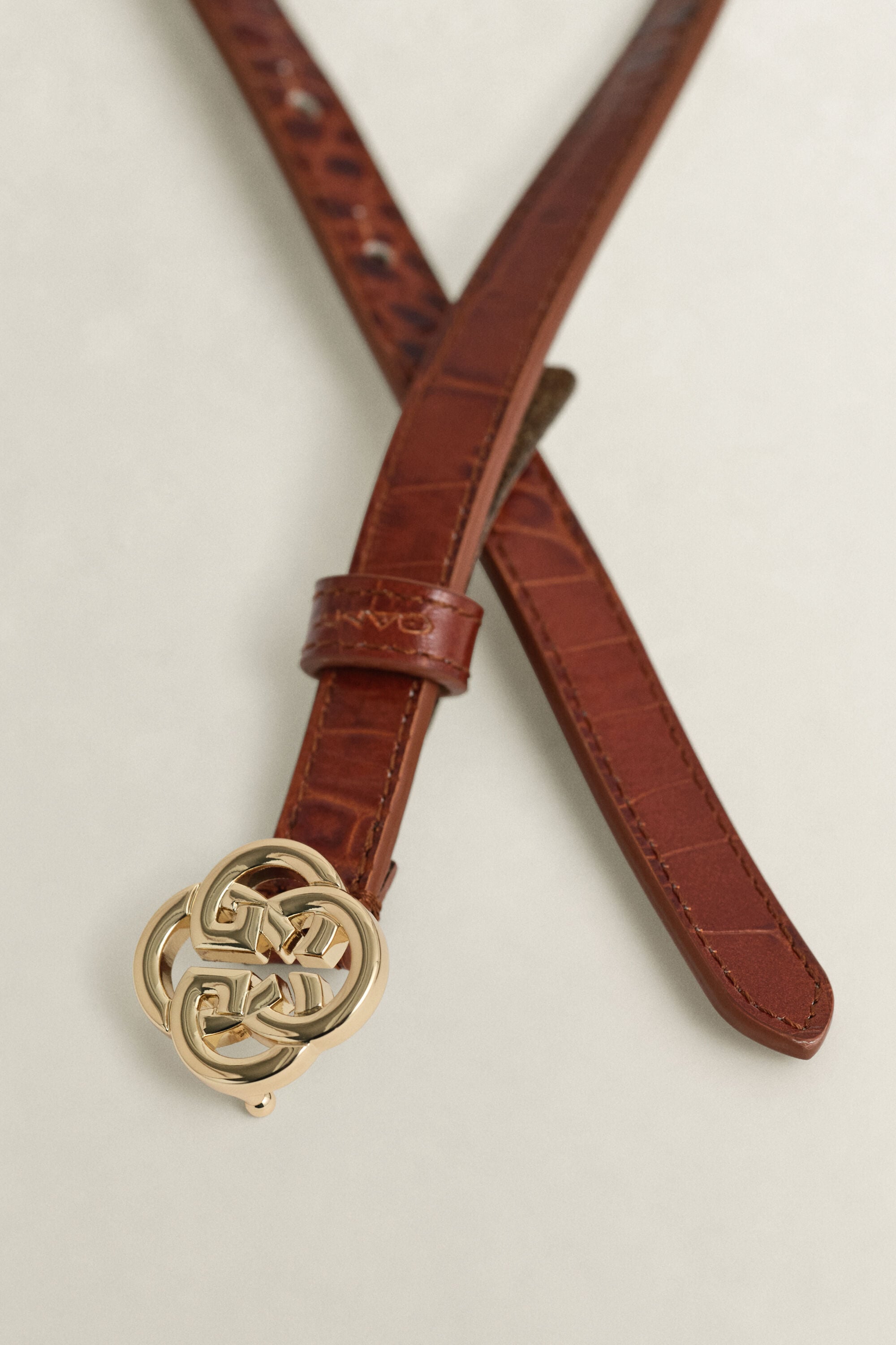Cintura monogramma effetto coccodrillo