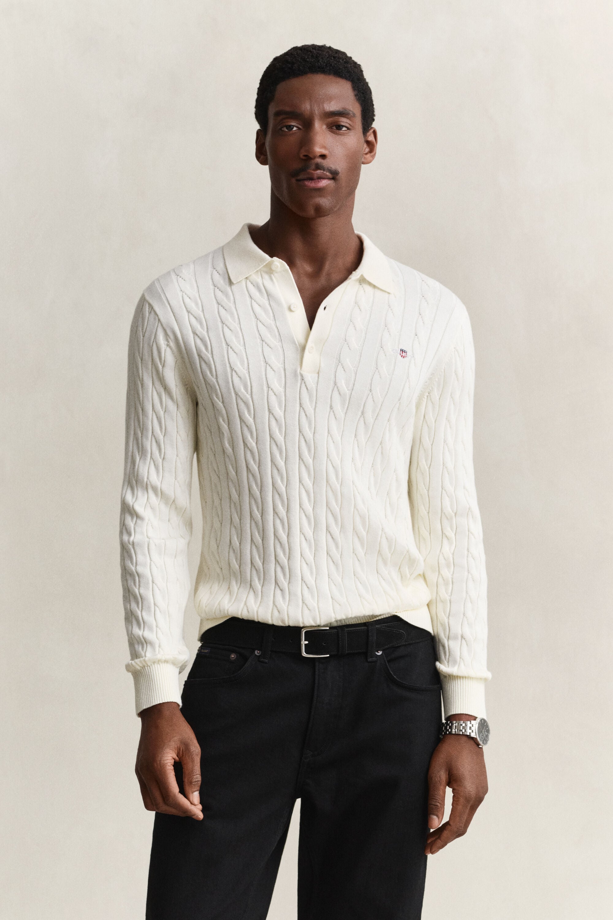 Polo in maglia a trecce in cotone