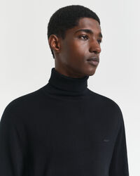 Maglia a collo alto in finissima lana merino