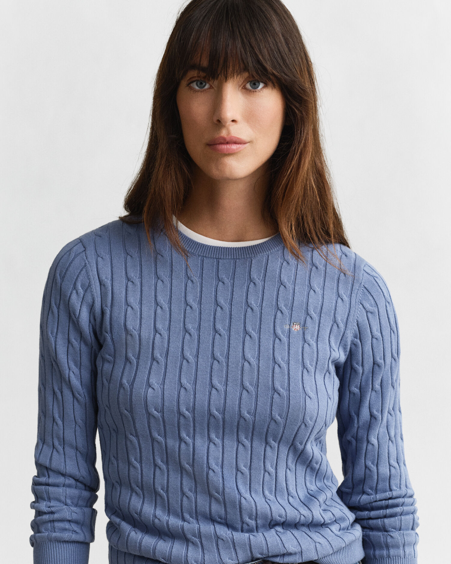 Maglia girocollo in cotone elasticizzato a trecce